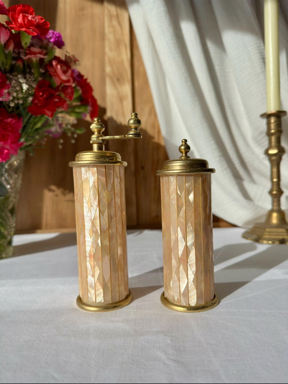 Antique brass and mother-of-pearl pepper and salt shaker set